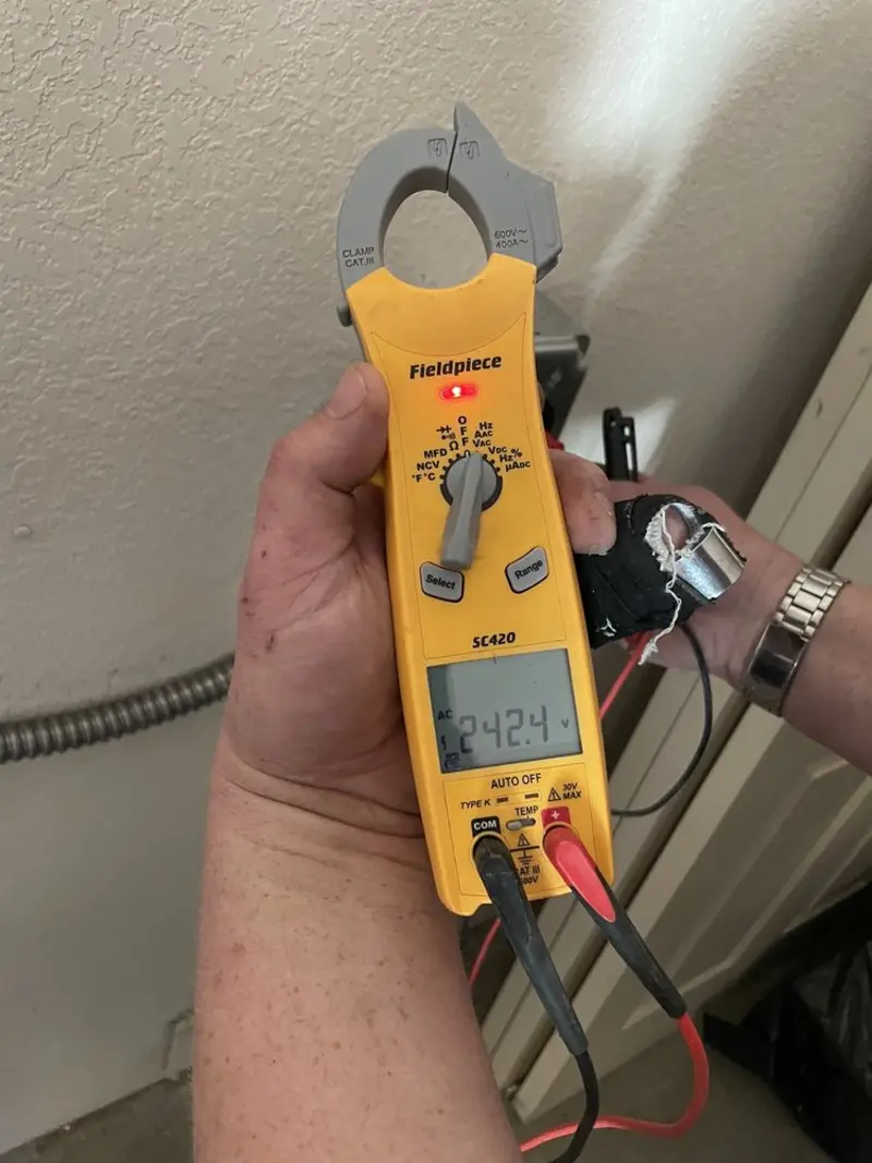 Voltage testing with clamp meter during Electrical Installation Services in Northvale